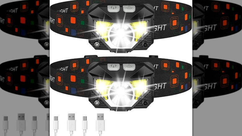 A pair of LHKNL Rechargeable Headlamps and their charging cables.