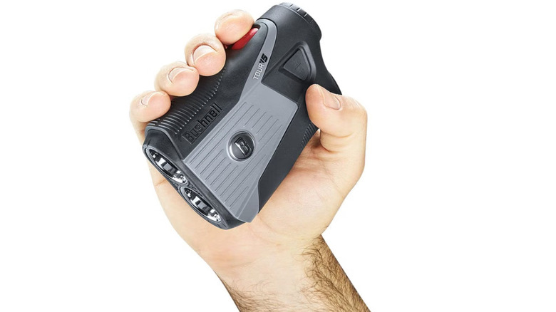 A man holding rangefinder