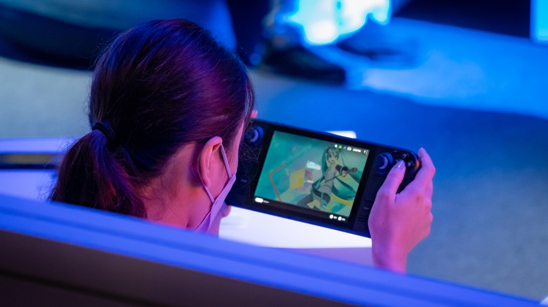 Someone playing Project Diva on a Steam Deck.
