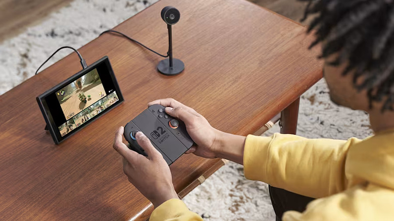 Someone playing Mario Kart World on a Nintendo Switch 2.
