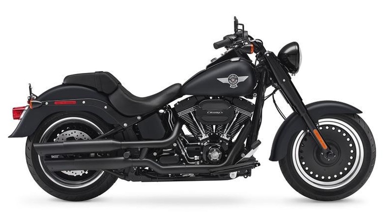 Sideways view of the 2016 Fat Boy S with a white backgroundd