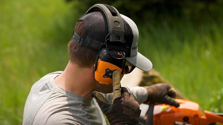 man wearing bluetooth earmuffs