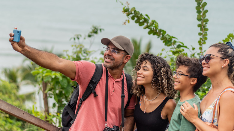 group taking a picture with an iphone