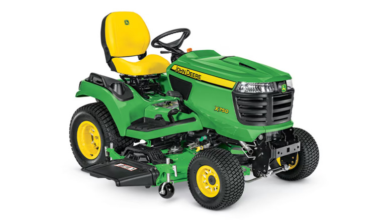 A John Deere X750 riding lawn mower on a white background