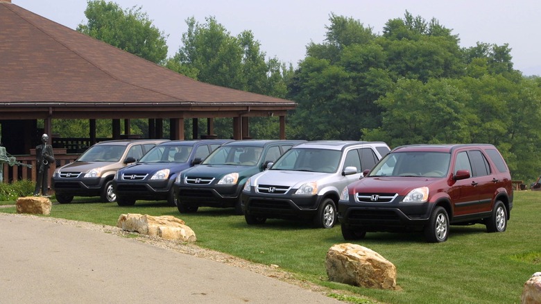A lineup of 2002 Honda CR-V units in all the different colors