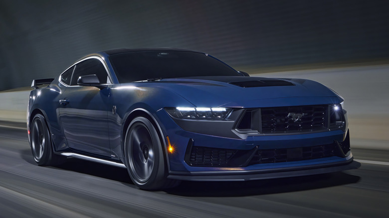 2024 Ford Mustang Dark Horse driving in a tunnel