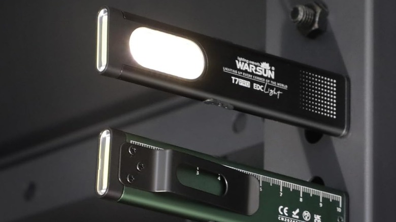 A compact flashlight with magnetic base