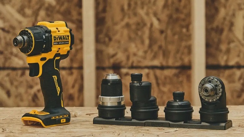 DeWalt Atomic 20V Max ½-inch Multi-Head Drill/Driver and attachments on OSB table