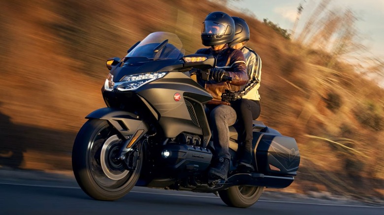 A couple riding a 2025 Honda Goldwing two-up.