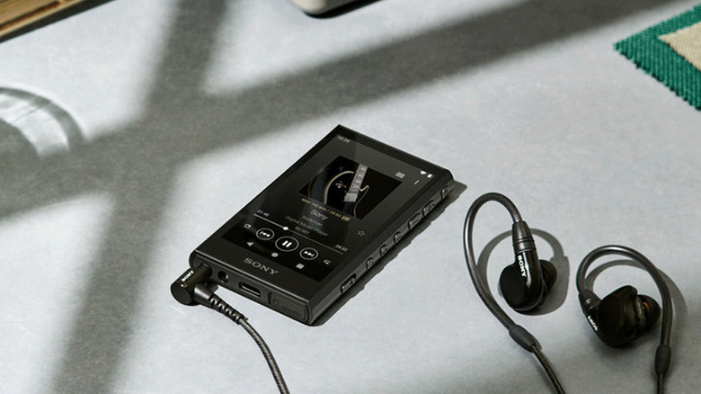 Sony NW-A306 and headphones on a table