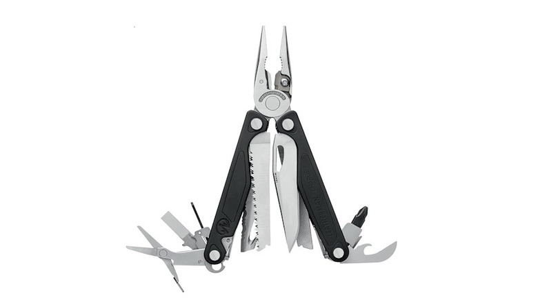 Silver and black Leatherman Charge+ TTI with pliers and tools out on a white background
