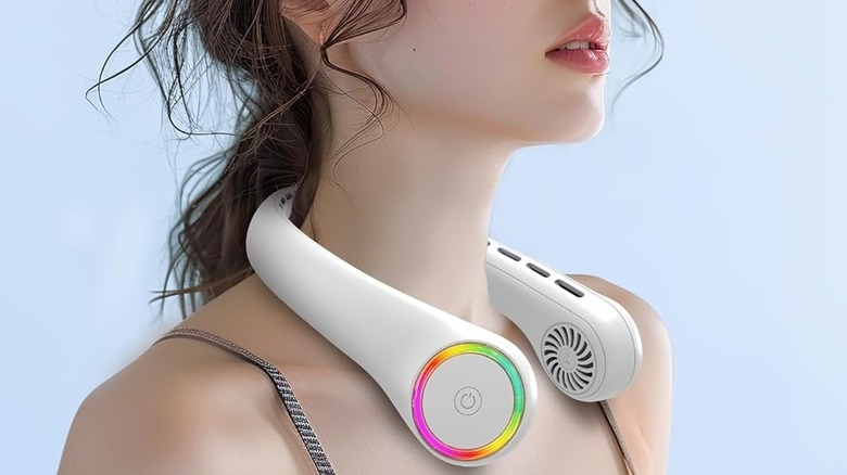 woman wearing neck fan