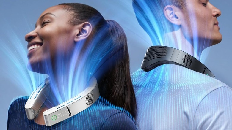 man and woman wearing neck air conditioner