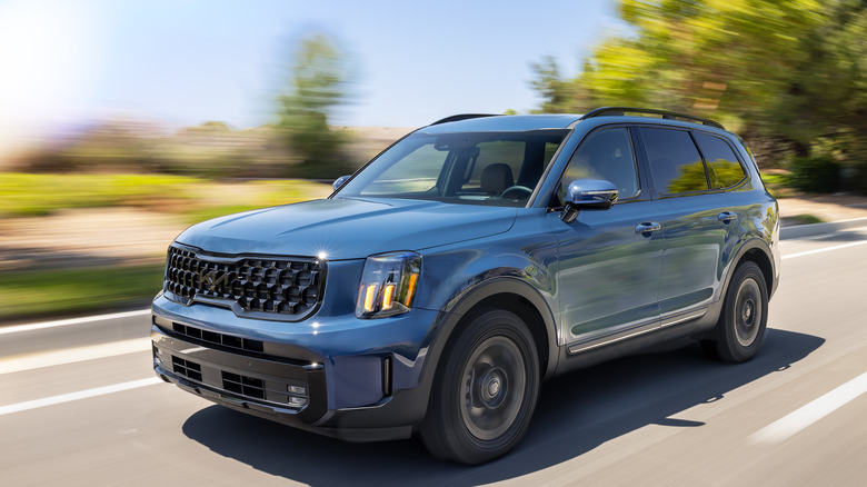 2025 Kia Telluride driving at speed, front-left view
