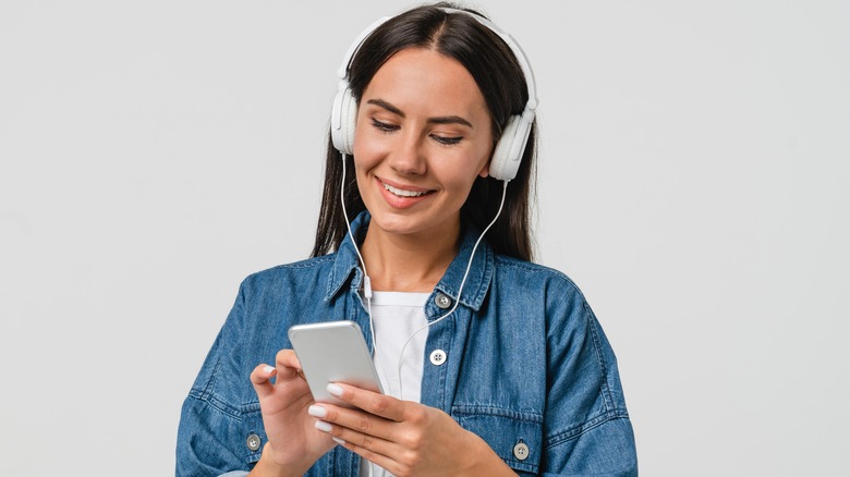 woman listening to music on phone