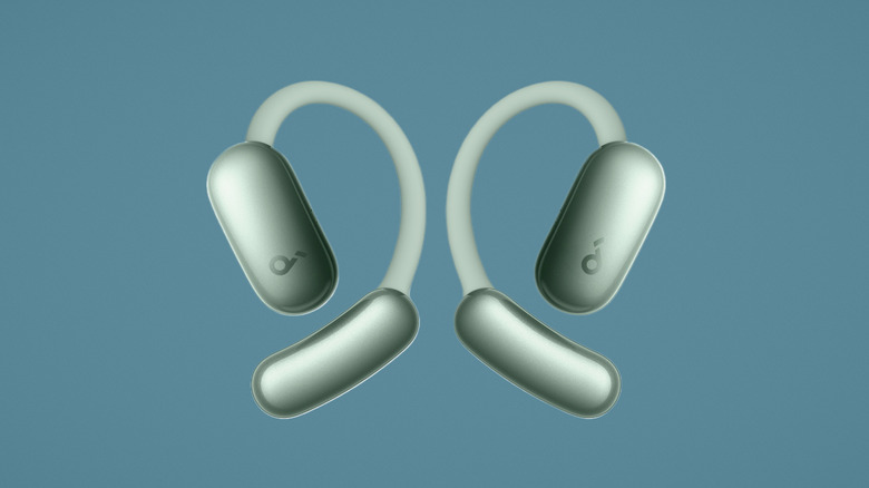 Green Anker Soundcore AeroFit 2 earbuds on a blue background