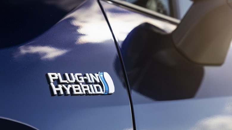 thumbnail interactive-video image 1 of Genuine Mitsubishi Plug-In Hybrid EV Side Badge Emblem – For Outlander 2013 – Rear Left/Right – 7415A455 1 of 4
