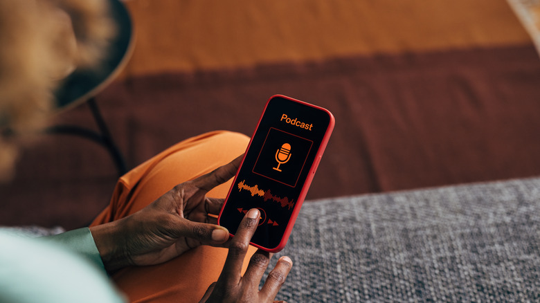 A person listening to a podcast