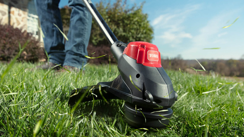 close up of Toro string trimmer in use