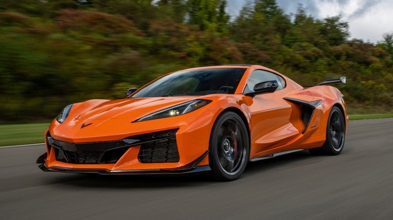 Orange C8 Corvette Z06 track driving