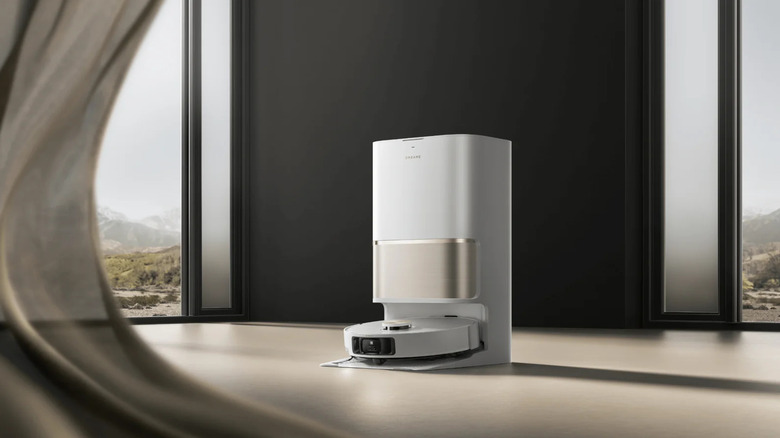 Dreame L50 in a living room on its charger.
