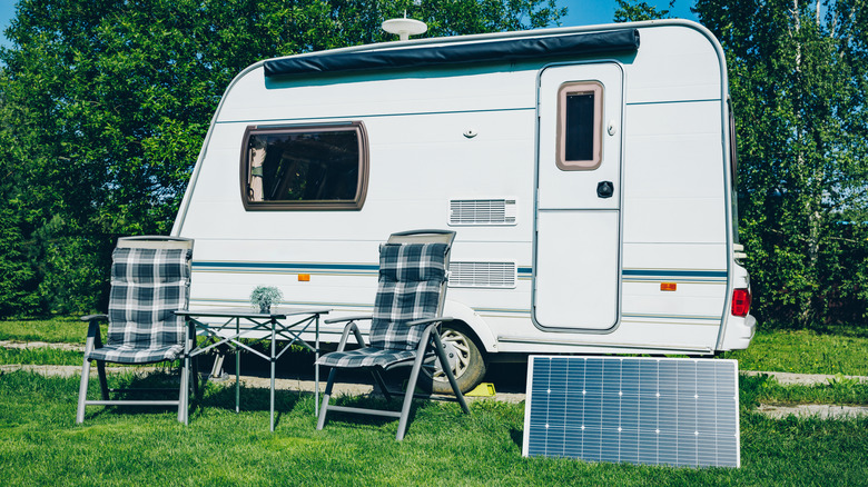 A solar panel mounted in front of an RV