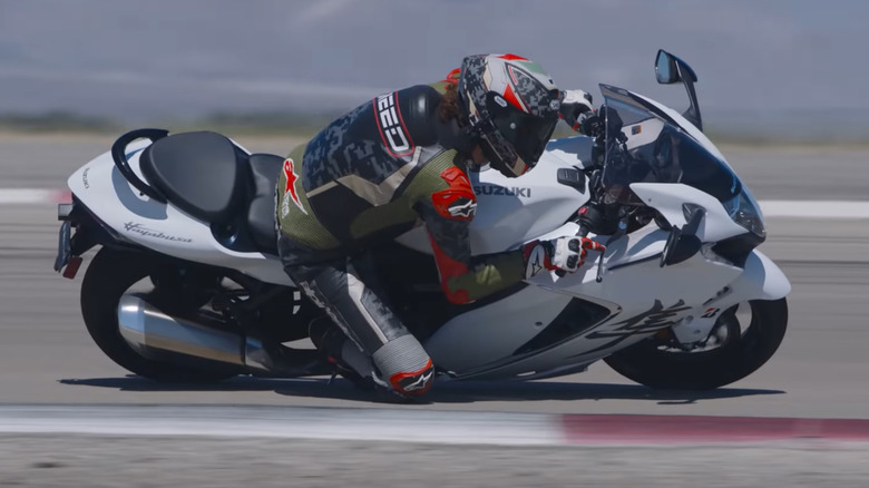 Rider riding a 2022 Suzuki Hayabusa GSX1300R in a closed track