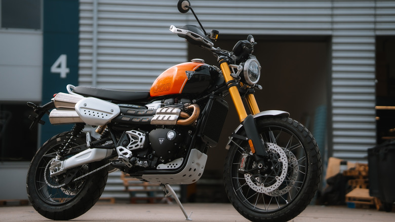 Triumph Scrambler 1200 XE motorcycle, adventure motorbike off-road urban setting