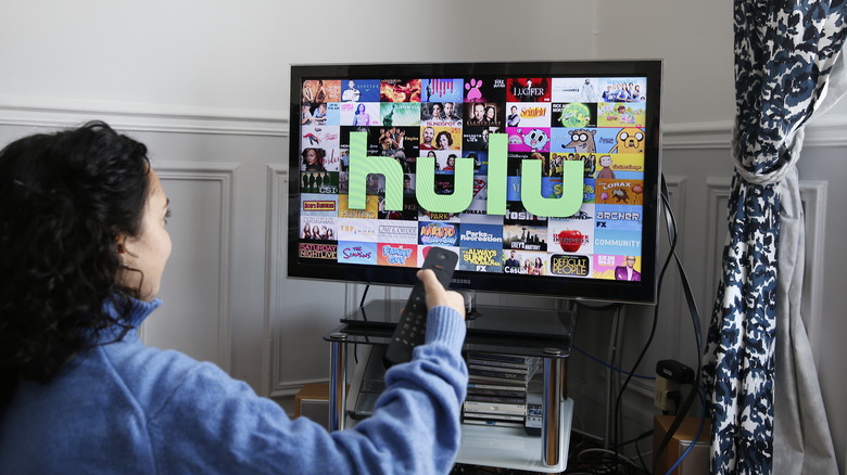 woman watching Hulu streaming service