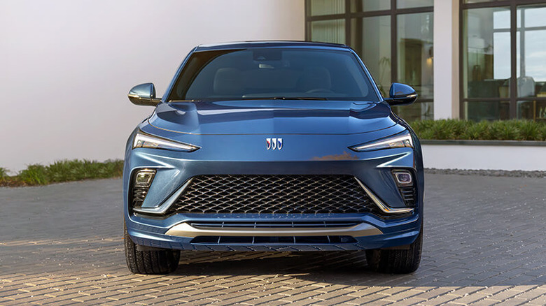 Ultramarine Buick Envista parked in front of a building