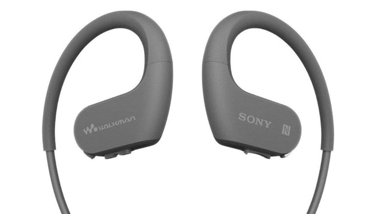 Close up of the Sony NW-WS623 Waterproof Walkman headset. The headset is gray in color and has the words Walkman and Sony on it alongside small logos.