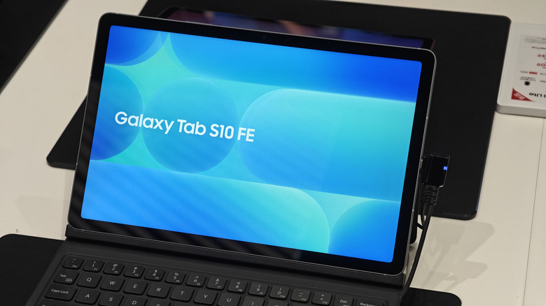 Galaxy Tab S10 tablet showing the blue startup screen.