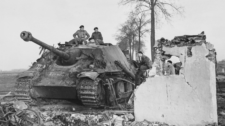 a destroyed Jagdpanther tank destroyer in the ruins of Netherlands