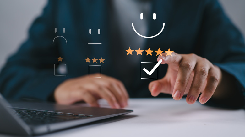 Holographic image of tick boxes and five stars