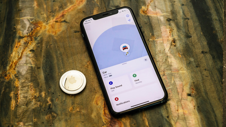 iPhone with AirTag on Table
