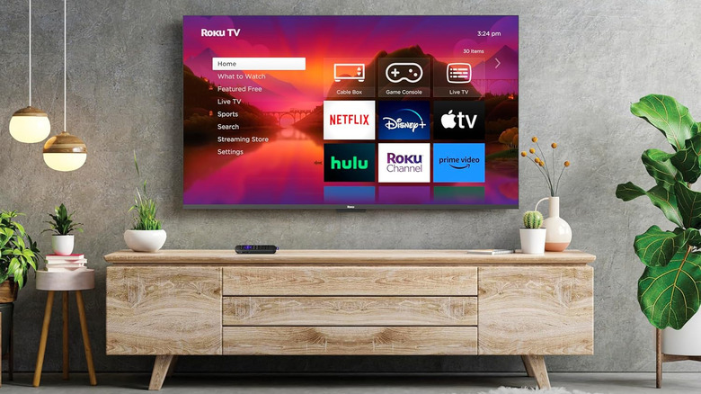 A wall-mounted Roku Select Series TV