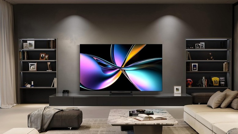 A TV mounted on a wall in a living room