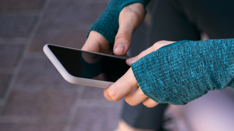 Woman holding phone