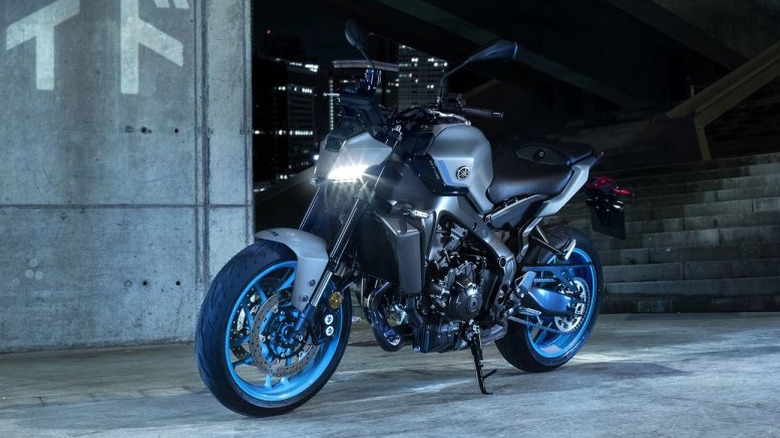 Yamaha MT-09 parked in front of concrete stairs