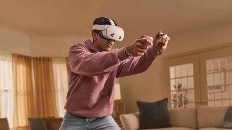 A man with a Meta Quest VR headset