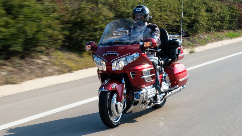 A rider riding the Honda Goldwing on a highway