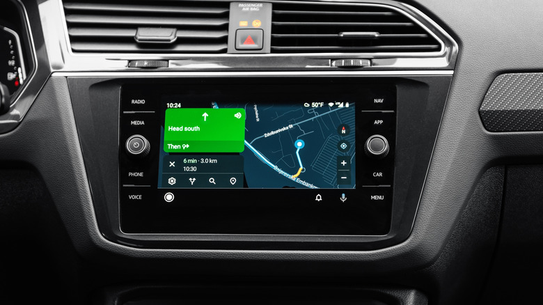 Google Maps navigation on a car's infotainment screen.