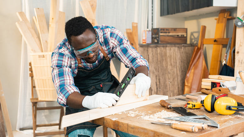 a carpenter working in his shop