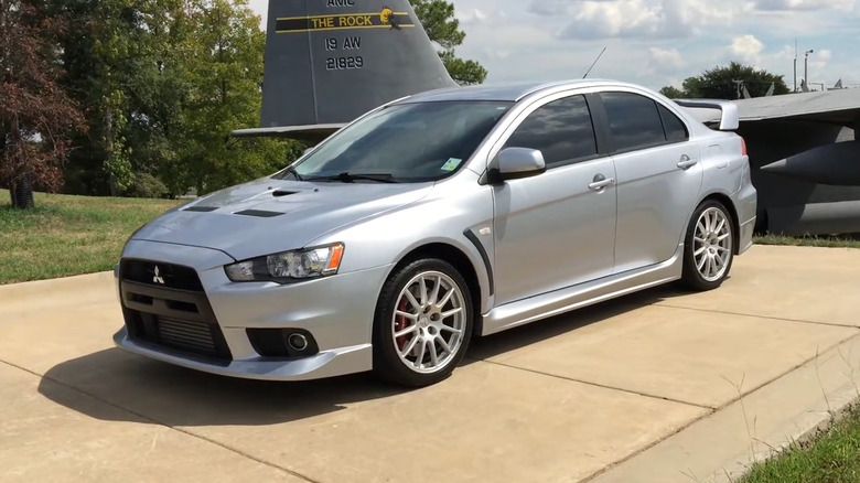 A side on shot of a 2008 Mitsubishi Lancer Evolution X