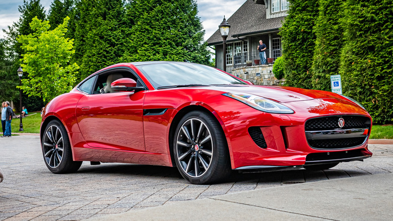 A side on shot of a red 2014 Jaguar F-Type