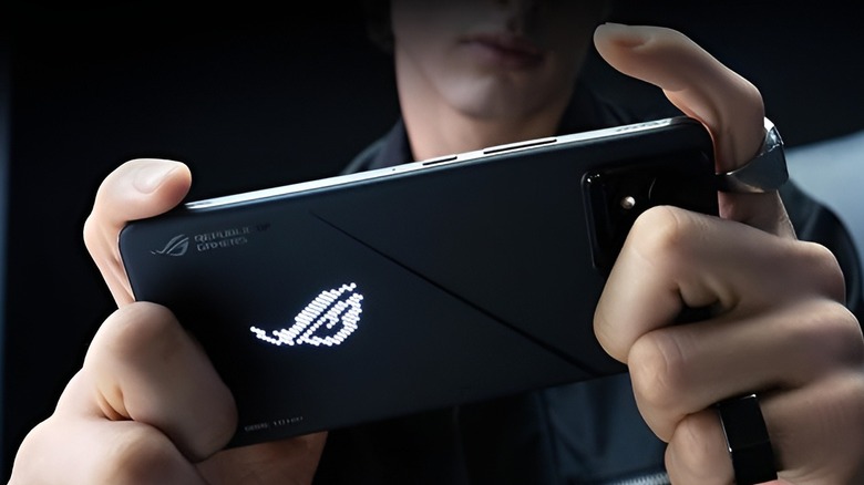 Person holding phone in landscape mode