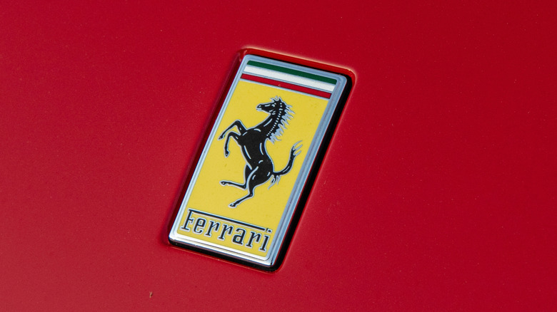 The current yellow Ferrari logo on a red vehicle