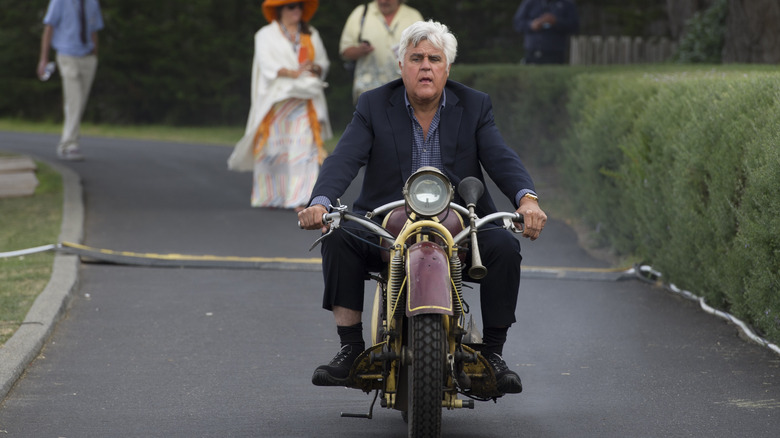 Jay Leno riding vintage motorcycle