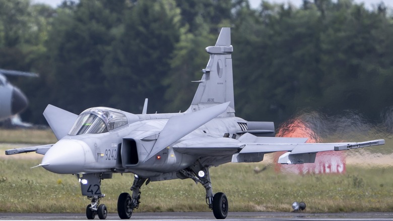 Saab JAS 39 Gripen taking off on a runway