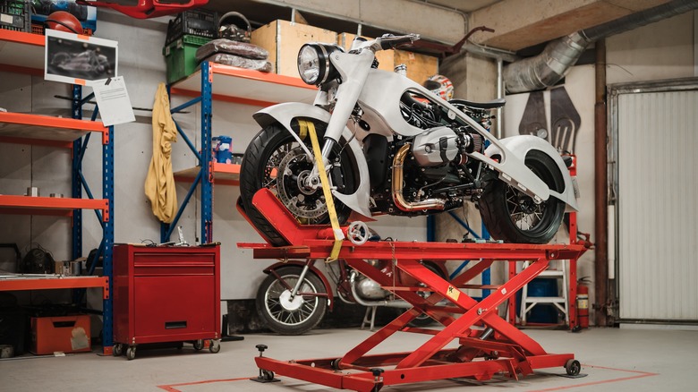 motorcycle on stand in garage